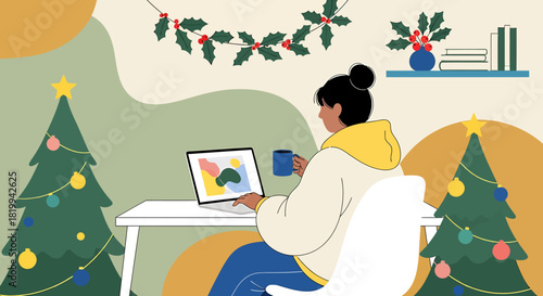 Woman working on laptop during Christmas holidays at home.