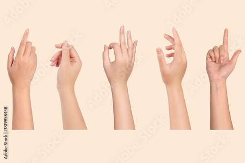 Set of Young woman hands showing on light brown background.