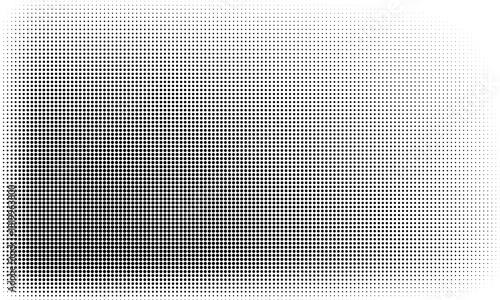 Minimalist black-and-white dot pattern with a central dark gradient blending outward into lighter tones.