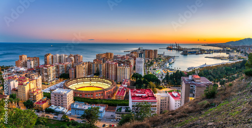 Sunset view of Plaza de Toros and Port of Malaga.  Andalusia, Spain