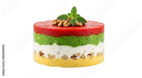 Layered savory cake with walnuts and mint garnish