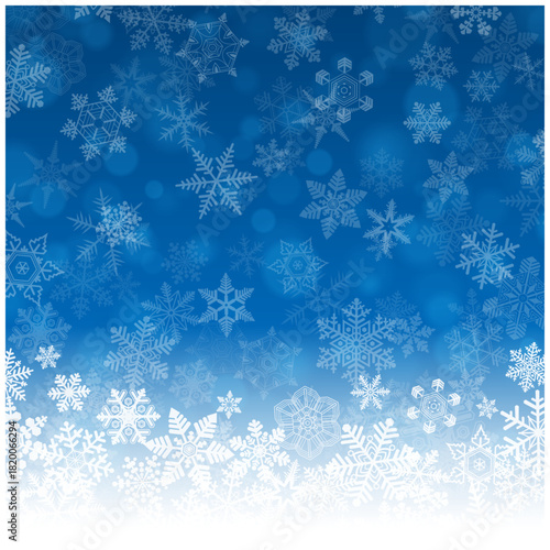 白い雪の結晶が散りばめられた冬の幻想的な青いベクター背景