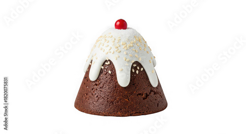 Festive christmas pudding with white icing and cherry topping