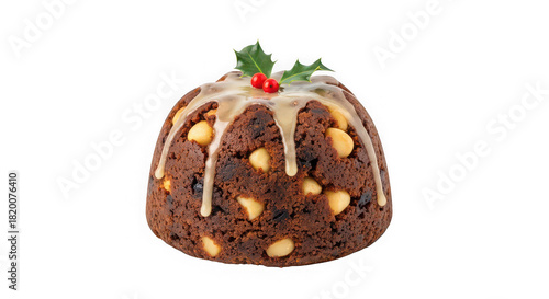 Traditional christmas pudding with icing and holly garnish