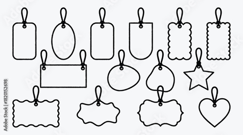 Variety of blank price tag shape outlines with string for retail sales