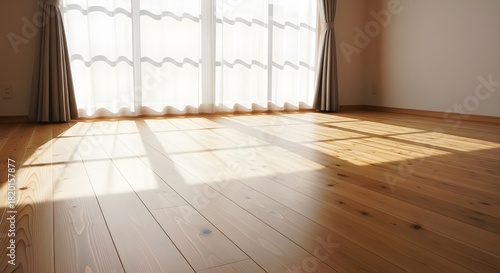 Wallpaper Mural Sunlight streaming through window onto hardwood floor in empty room creating warm and inviting atmosphere with natural light and clean lines Torontodigital.ca