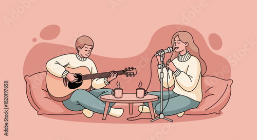 A man plays guitar while a woman sings into a microphone.