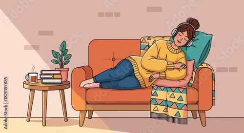 Woman relaxing on couch listening to music with headphones.