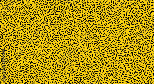 A vibrant yellow background adorned with a dense pattern of small black dashes and strokes.