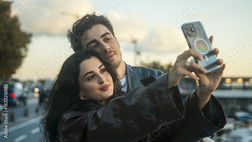 Couple Taking Selfie Together at Sunset
