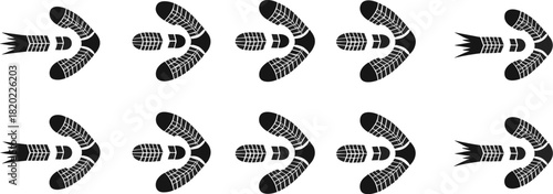Black boomerang shape with tire tread pattern and arrow elements black and white