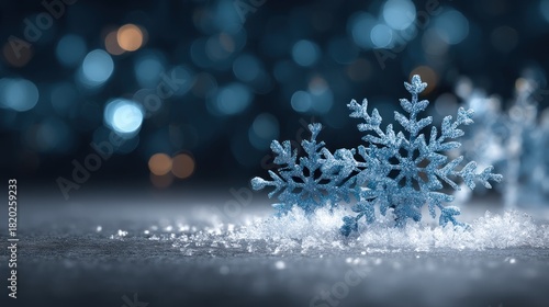 A single snowflake with a blue hue, lying on a snowy surface with a blurred background of blue lights.