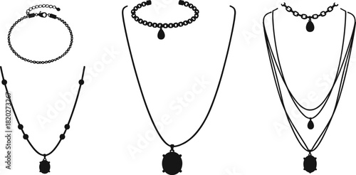 Collection of black silhouette jewelry including bracelets and necklaces with pendants