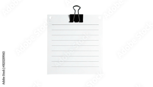 White lined paper clipped to a holder, against a black background