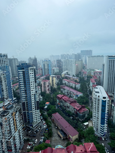 City skyline view of residential buildings and urban life during a cloudy day in Lagos, Nigeria