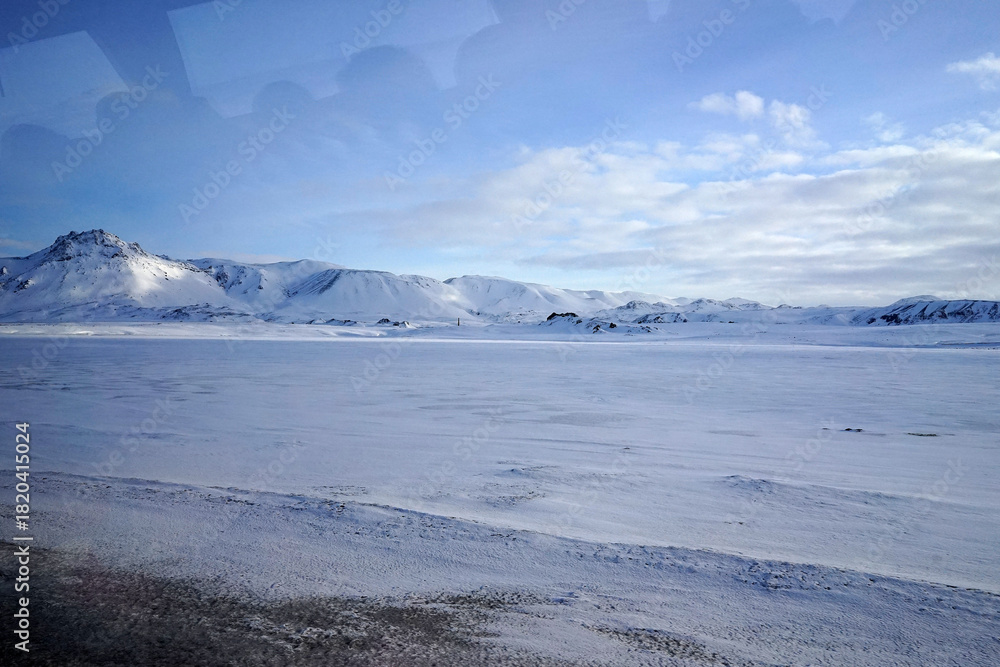 Obraz premium Natural landscape of snowy mountain range with foggy and mist sky, Iceland