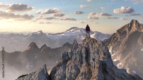 Hiker Standing on a Mountain Peak at Sunrise Over a Vast Snowy Landscape, 3D Rendered