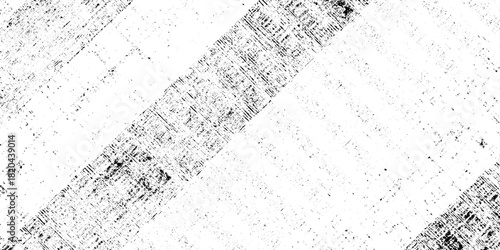 Abstract texture grunge made of diagonal streaks and distressed lines, black ink on a white background. grunge scratch patterns, chaotic linear noise. dirty monochrome pattern of the old worn surface.