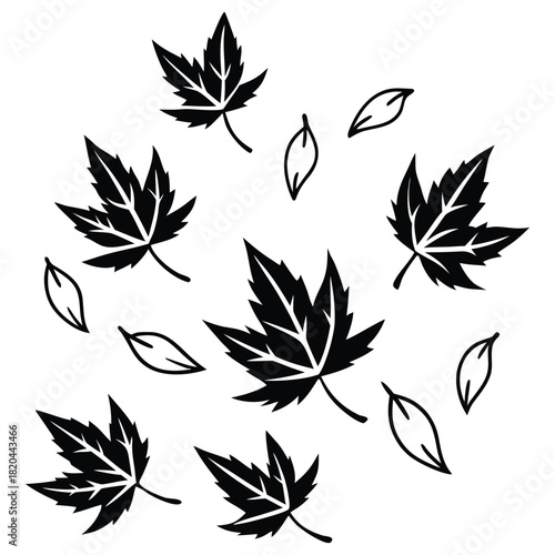 A black silhouette of falling leaves vector