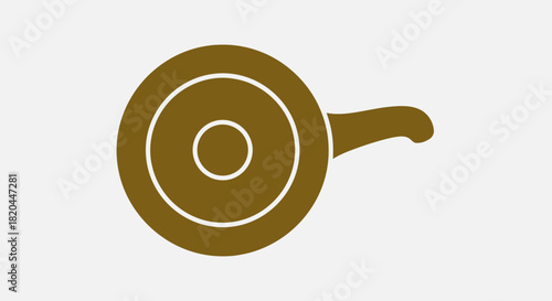 A brown stylized illustration of a frying pan with concentric circles on a white background.