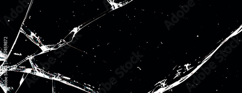 A black background with a shattered glass texture. The background is predominantly black, featuring sharp, white cracks throughout. Cracked glass background vector. Black background.