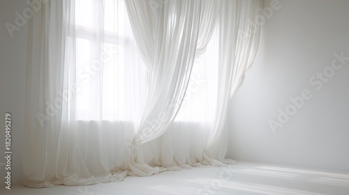 Soft sunlight illuminates a minimalist room with sheer white curtains, creating a serene and peaceful atmosphere.
