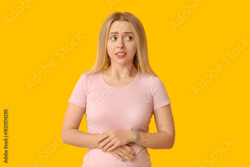 Embarrassed young woman on ...