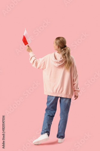 Young woman with flag of Po...