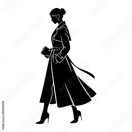 Silhouette of woman walking in trench coat holding clutch in black and white