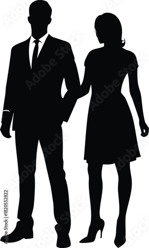 A silhouetted couple formally dressed holding hands and standing closely together high quality