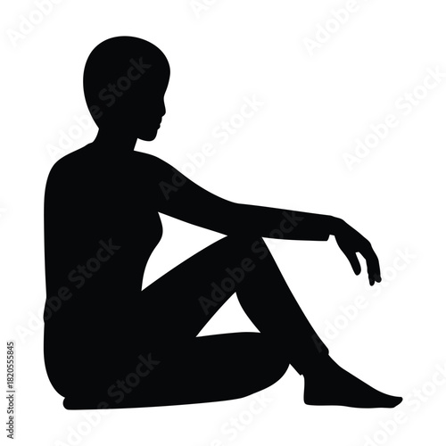 Silhouette of a woman sitting on the ground, looking to the right, isolated on