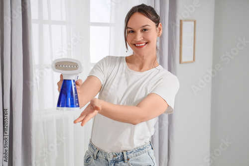 Beautiful young woman with ...