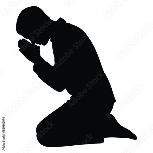 Silhouette of a person kneeling in prayer, with hands clasped together, showing devotion and spirituality, isolated on