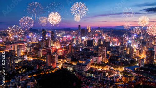 Colorful fireworks illuminating a vibrant city skyline at night