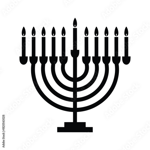 Traditional jewish menorah with nine lit candles, a symbol of light and celebration during hanukkah, isolated on