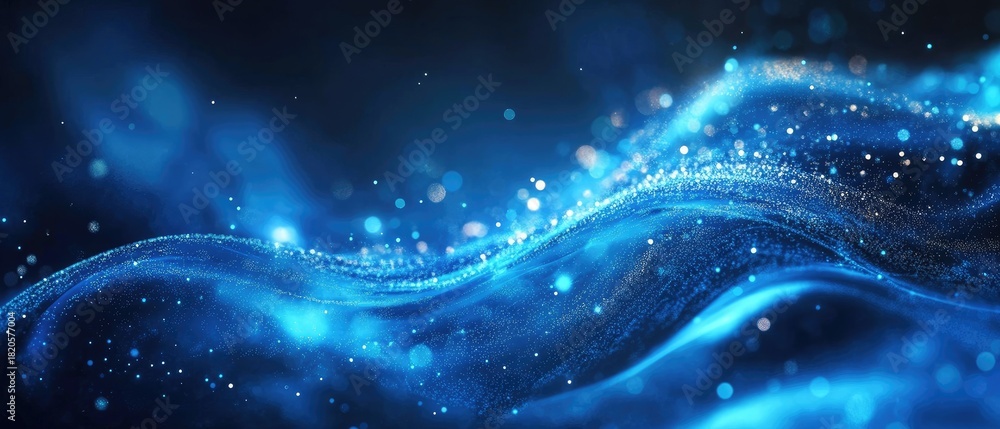Fototapeta premium Blue waves of sparkling, glittering particles