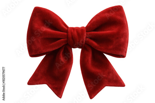 A large red velvet bow with a soft plush texture is tied in a classic knot, perfect for festive holiday gift wrapping or elegant seasonal decoration