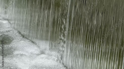 Malaysia, Kuala Lumpur 17.08.2026 - A walk in the park, fountains, water flowing against a backdrop of nature, capital of Asian flora and fauna, a beautiful artificial waterfall, cityscape
