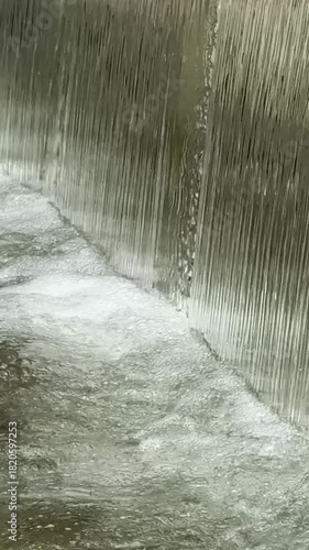 Malaysia, Kuala Lumpur 17.08.2026 - A walk in the park, fountains, water flowing against a backdrop of nature, capital of Asian flora and fauna, a beautiful artificial waterfall, cityscape
