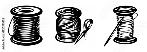 Three spools of thread and two needles representing sewing and crafting essentials