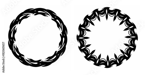 Two abstract black circular frames with organic textured patterns and sharp spiked elements against