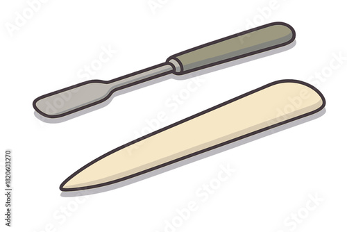 Bone folder and small spatula essential tools for bookbinding and paper crafts