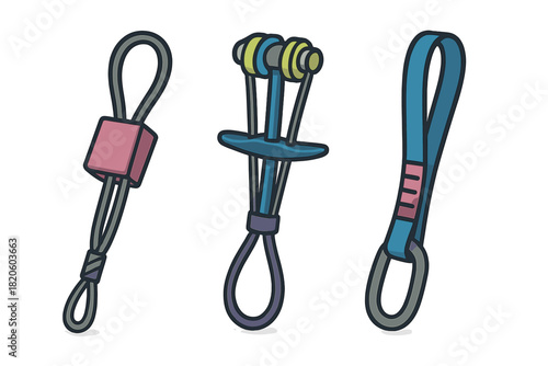 Colorful set of rock climbing protection equipment including cam, nut, and quickdraw