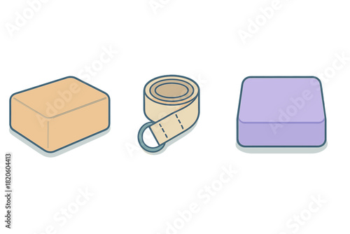 Sewing and crafting tools including a rolled measuring tape and two rectangular blocks