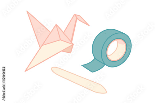 Soft colored origami paper crane, adhesive tape roll, and craft stick for hobbies