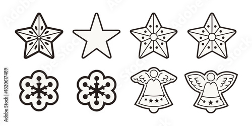 A collection of decorative Christmas cookie cutters in various shapes including stars, snowflakes, and angels.