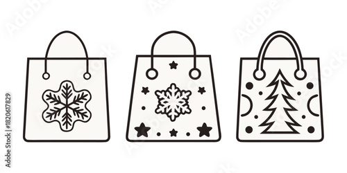 Three shopping bags decorated with Christmas and winter motifs are lined up.