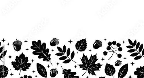 Autumn leaves and acorns create a festive border with sparkling stars