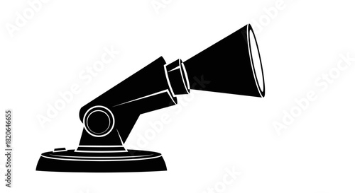 A black and white illustration of a spotlight or stage light fixture on a base.