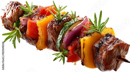 Juicy shish kebab with vegetables and rosemary garnish, isolated on white, top view